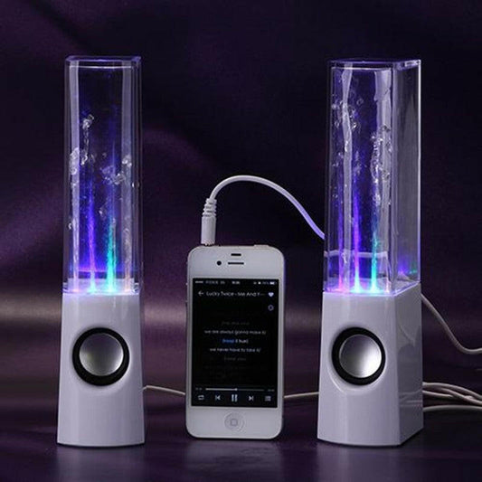 Two wireless dancing water speakers with LED lights and a smartphone connected, displaying colorful water dancing to music.