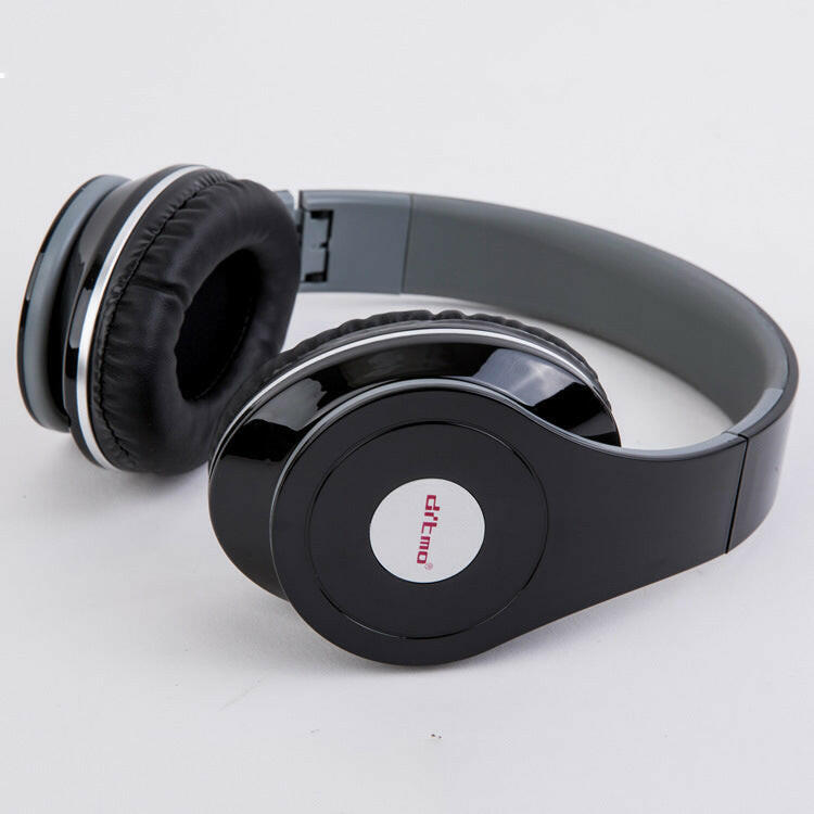 Sleek black wired headphones positioned on a white background, emphasizing their modern design.