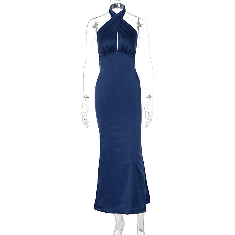 Display of a navy blue summer backless dress on a mannequin, showcasing the chic halter neck design.